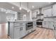 Gourmet kitchen featuring an island with pendant lights and stainless steel appliances at 8981 Callaway Dr, Winston, GA 30187