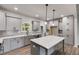 Well-equipped kitchen featuring an island, ample storage, and stainless steel appliances at 8981 Callaway Dr, Winston, GA 30187