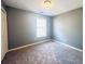 Spacious bedroom with neutral walls and carpet at 420 Old Holcomb Bridge Rd, Roswell, GA 30076