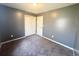 Well-lit bedroom featuring grey walls and carpet at 420 Old Holcomb Bridge Rd, Roswell, GA 30076