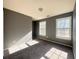 Well-lit bedroom with two windows and grey walls at 420 Old Holcomb Bridge Rd, Roswell, GA 30076