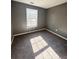 Bright bedroom with neutral walls and carpet at 420 Old Holcomb Bridge Rd, Roswell, GA 30076