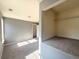 Bedroom with gray walls, carpet, and a built-in closet at 420 Old Holcomb Bridge Rd, Roswell, GA 30076