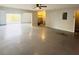 Spacious garage with an open layout and extra storage shelving at 420 Old Holcomb Bridge Rd, Roswell, GA 30076