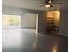 Spacious garage with an open layout and extra storage shelving at 420 Old Holcomb Bridge Rd, Roswell, GA 30076