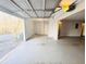 Garage with open door, showing driveway and access to the house at 420 Old Holcomb Bridge Rd, Roswell, GA 30076