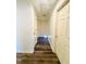 Bright hallway with wood-look flooring and multiple doors at 420 Old Holcomb Bridge Rd, Roswell, GA 30076