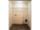 Laundry closet with shelving and hookups for a washer and dryer at 420 Old Holcomb Bridge Rd, Roswell, GA 30076