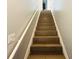 Modern staircase with tile flooring and simple handrail at 420 Old Holcomb Bridge Rd, Roswell, GA 30076