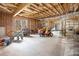 Unfinished basement featuring exposed ceiling, unfinished walls and equipment at 490 Dorsey Road Rd, Hampton, GA 30228