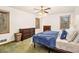 Comfortable bedroom with natural light, classic ceiling fan, and ample storage space at 490 Dorsey Road Rd, Hampton, GA 30228