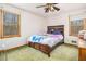 Cozy bedroom featuring bright natural light and a ceiling fan at 490 Dorsey Road Rd, Hampton, GA 30228