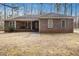Inviting single-story brick home with a covered porch and a well-manicured front yard at 490 Dorsey Road Rd, Hampton, GA 30228