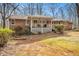 Attractive brick home with inviting front porch and well-maintained landscaping at 490 Dorsey Road Rd, Hampton, GA 30228