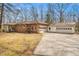 Spacious home featuring a multi-car garage and a well-manicured lawn at 490 Dorsey Road Rd, Hampton, GA 30228