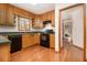 Well-lit kitchen features wooden cabinets and modern appliances, perfect for cooking and entertaining at 490 Dorsey Road Rd, Hampton, GA 30228