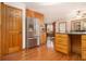 Spacious kitchen with wood cabinets, stainless steel refrigerator, and adjoining breakfast nook at 490 Dorsey Road Rd, Hampton, GA 30228