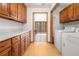 Well-equipped laundry room with ample counter space and modern washer and dryer at 490 Dorsey Road Rd, Hampton, GA 30228