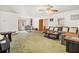 Bright and airy living room with a comfortable gray sofa, offering plenty of space and natural light at 490 Dorsey Road Rd, Hampton, GA 30228
