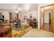 Cozy living room with plush furniture, ceiling fan, and abundant natural light at 490 Dorsey Road Rd, Hampton, GA 30228