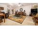 Spacious living room with plush furniture, ceiling fan, and area rug at 490 Dorsey Road Rd, Hampton, GA 30228
