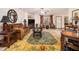 Cozy living room with plush furniture, ceiling fan, and abundant natural light at 490 Dorsey Road Rd, Hampton, GA 30228