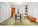 Functional room with extra storage space with white closet and a small table with an underneath shelf at 490 Dorsey Road Rd, Hampton, GA 30228
