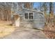A storage building is on the property with a concrete driveway and single door access at 490 Dorsey Road Rd, Hampton, GA 30228