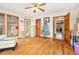 Bright room with hardwood floors and multiple windows with natural lighting and outdoor views at 490 Dorsey Road Rd, Hampton, GA 30228