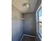 Small walk-in closet with wire shelving and neutral gray walls at 10411 Ivygate Ter, Jonesboro, GA 30238