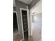 Walk-in closet with wire shelving and neutral gray walls at 10411 Ivygate Ter, Jonesboro, GA 30238