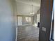 View of living room from entryway, gray walls and floors at 10411 Ivygate Ter, Jonesboro, GA 30238