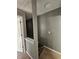 Upstairs hallway with carpeted staircase and access to bedrooms at 10411 Ivygate Ter, Jonesboro, GA 30238