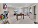 Finished basement with foosball table and TV at 135 Cessna Dr, Canton, GA 30114