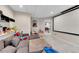 Basement rec room with sectional sofa and projector at 135 Cessna Dr, Canton, GA 30114