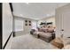 Basement rec room with sectional sofa and projector at 135 Cessna Dr, Canton, GA 30114