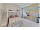 Charming bedroom with built-in bunk beds and rainbow wall at 135 Cessna Dr, Canton, GA 30114