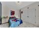bedroom with Spiderman decor and double closets at 135 Cessna Dr, Canton, GA 30114