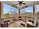 Relaxing deck with wicker furniture and wooded views at 135 Cessna Dr, Canton, GA 30114