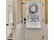 Front entry with white door and a keyless entry system at 135 Cessna Dr, Canton, GA 30114