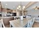 Open concept kitchen with granite counters and island at 135 Cessna Dr, Canton, GA 30114