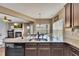 Kitchen island with granite countertop and double sink at 135 Cessna Dr, Canton, GA 30114