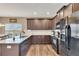 Modern kitchen with stainless steel appliances and granite counters at 135 Cessna Dr, Canton, GA 30114