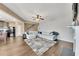 Spacious living room with L-shaped sectional sofa and fireplace at 135 Cessna Dr, Canton, GA 30114