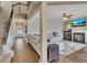 Spacious living room with a cozy fireplace and hardwood floors at 135 Cessna Dr, Canton, GA 30114