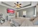 Spacious main bedroom with large TV and en-suite bathroom access at 135 Cessna Dr, Canton, GA 30114