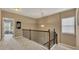 Spacious upstairs hallway with access to bedrooms and stairs at 135 Cessna Dr, Canton, GA 30114