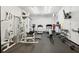 Well-equipped gym with weight machines, treadmill, elliptical and free weights, providing residents with a convenient fitness space at 3060 Pharr Court N # 607, Atlanta, GA 30305