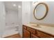 Clean bathroom with a single sink vanity and shower/tub combo at 3989 Arborwood Ln, Tucker, GA 30084