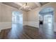 Open concept dining room with hardwood floors and architectural details at 5590 Vickery Cir, Cumming, GA 30040